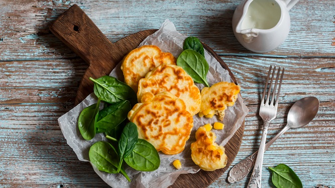 Corn cakes with shrimp and jalapeño-lime drizzle.