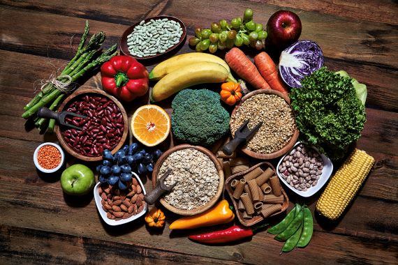 photo of fibrous foods like beans, nuts, oatmeal, fruits and vegetables