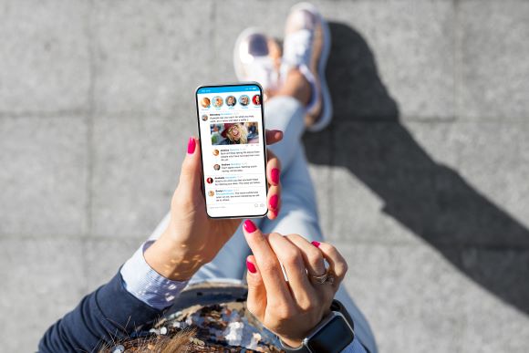 photo of a person holding a smartphone