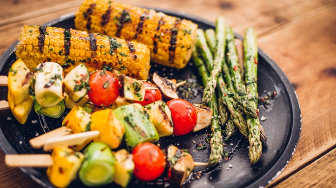 Summer dinner featuring fruits and vegetables.