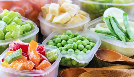 containers of frozen fruits and vegetables